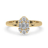 Cluster Halo Engagement Ring with baguette and round diamonds in a prong setting.
