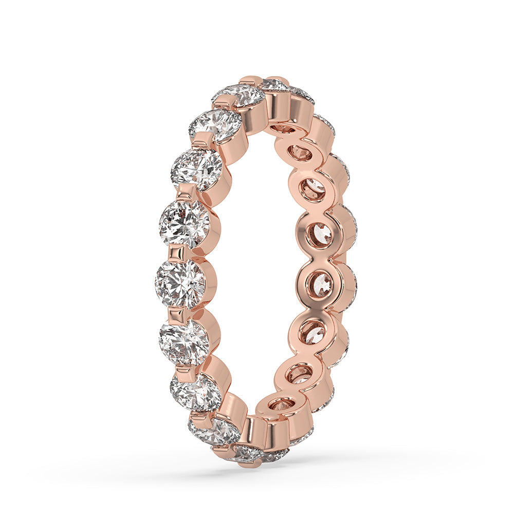 Shared prong wedding band with round diamonds for a classic look.

