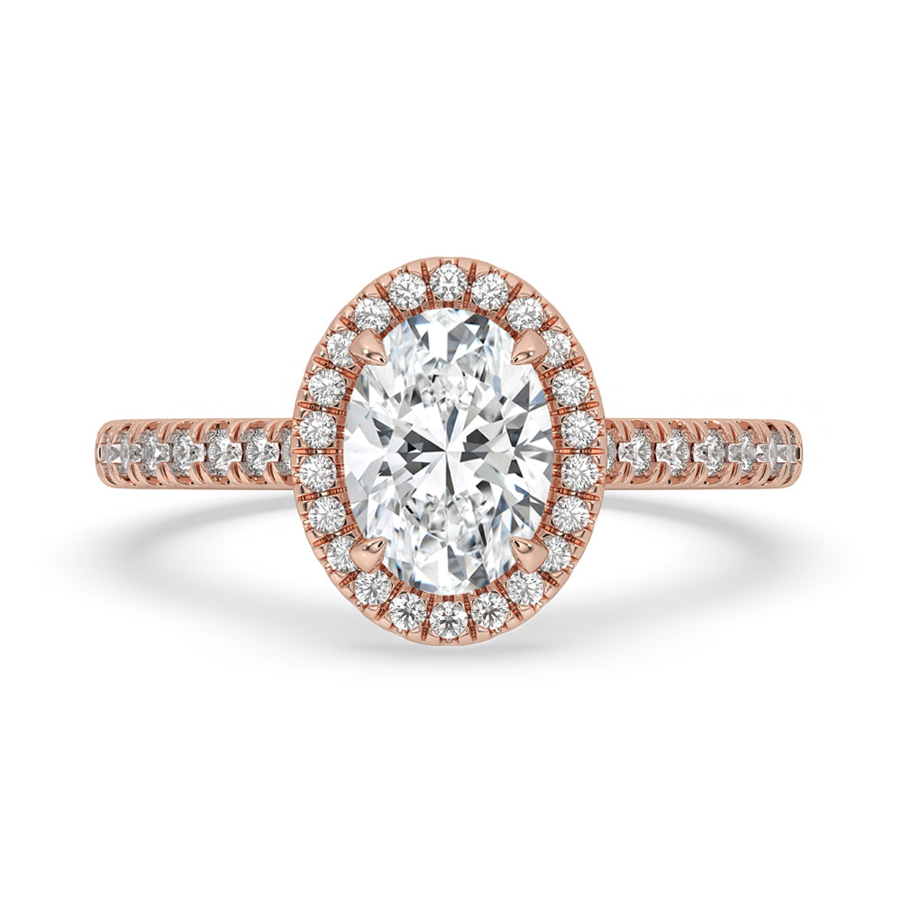 Oval diamond ring in a delicate claw prong setting with IGI-certified craftsmanship.
