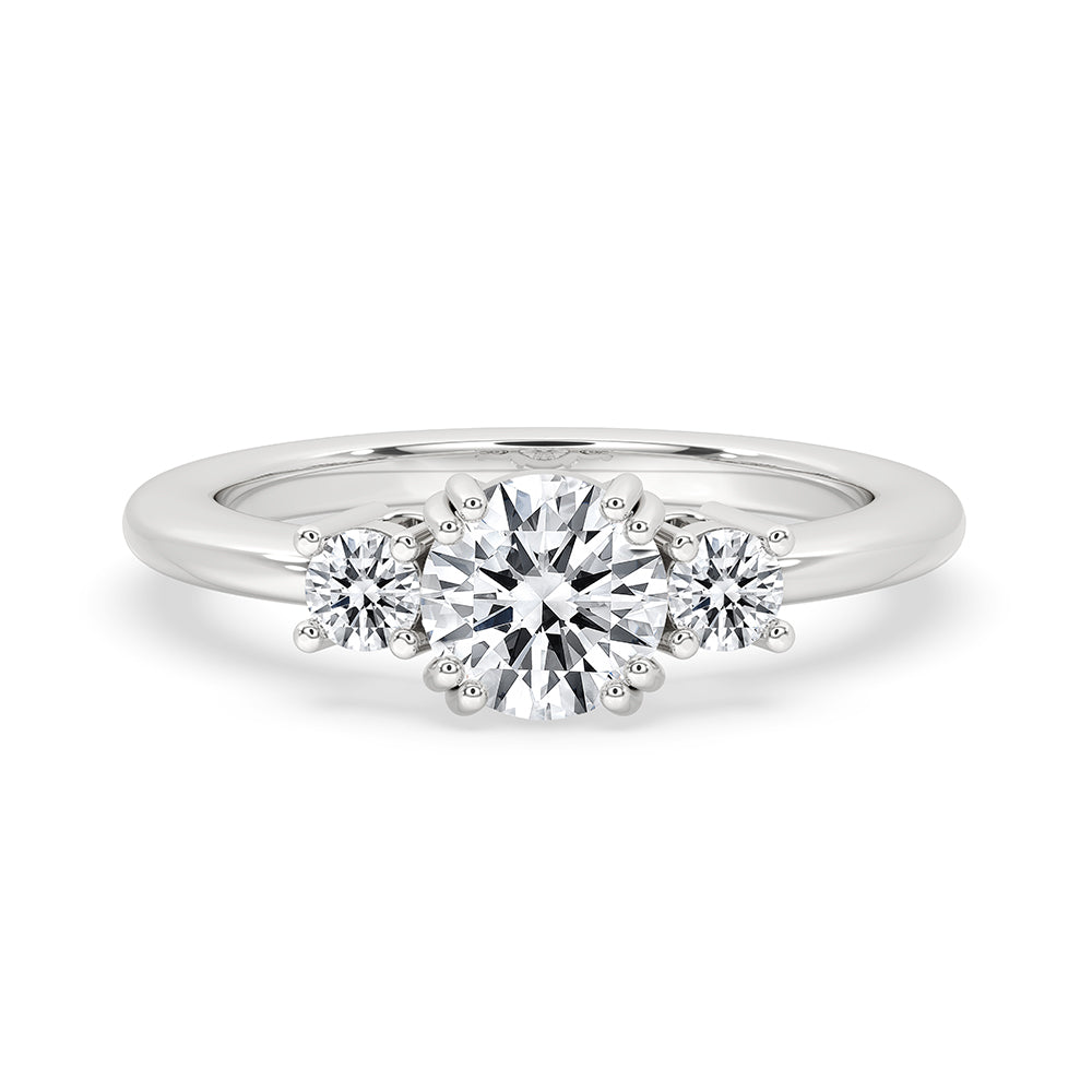 Double Prong Engagement Ring featuring a round cut diamond in white gold.
