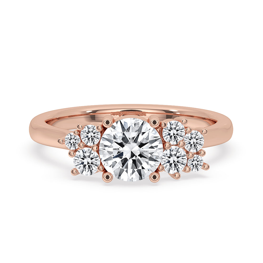 Cluster Setting Diamond Ring with round cut diamonds in prong setting.
