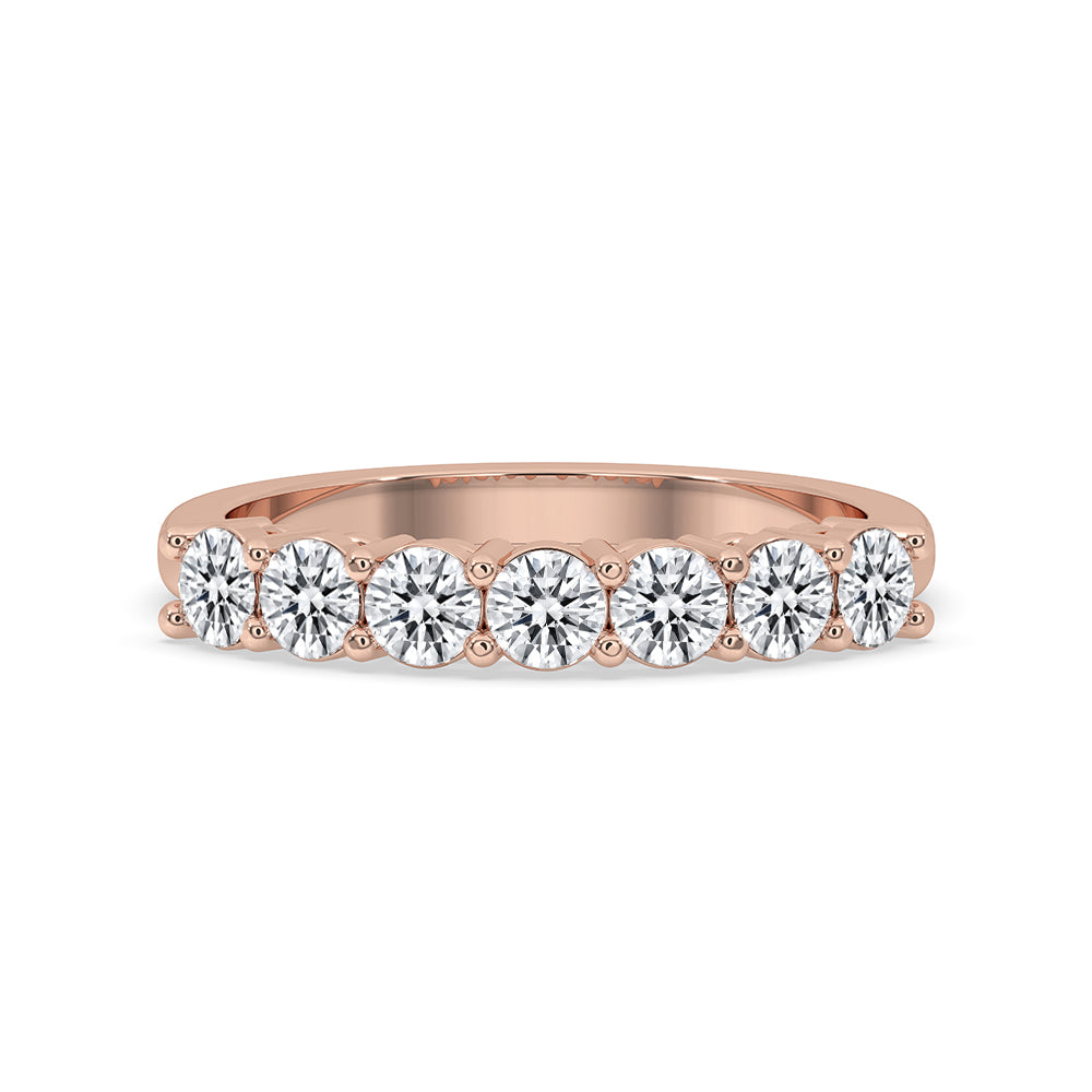 7 Stone Diamond Band designed with round cut diamond band and half eternity band.
