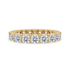 Yellow Gold Wedding Band crafted with round cut diamonds in full eternity style.
