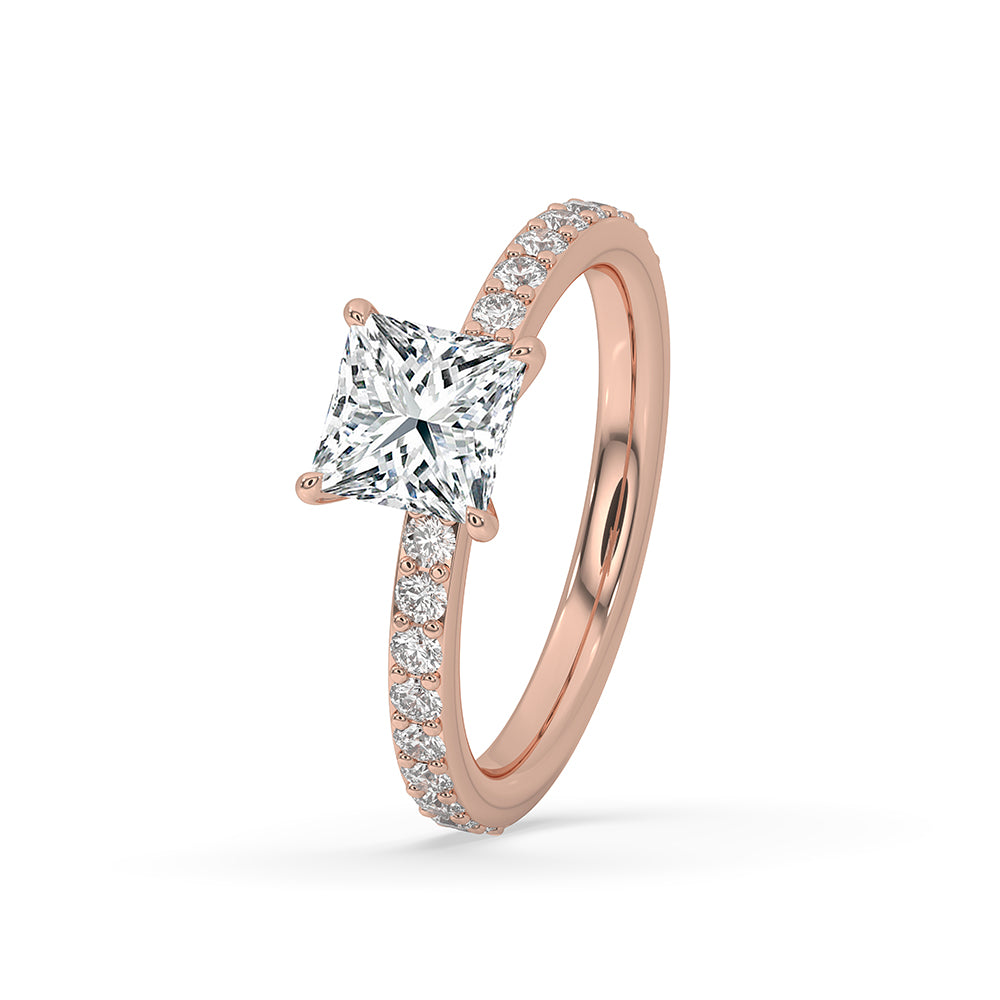 Custom engagement ring featuring a stunning Princess Cut diamond with a pave setting.
