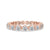 Rose Gold Eternity Band with round cut diamonds in shared prong setting.

