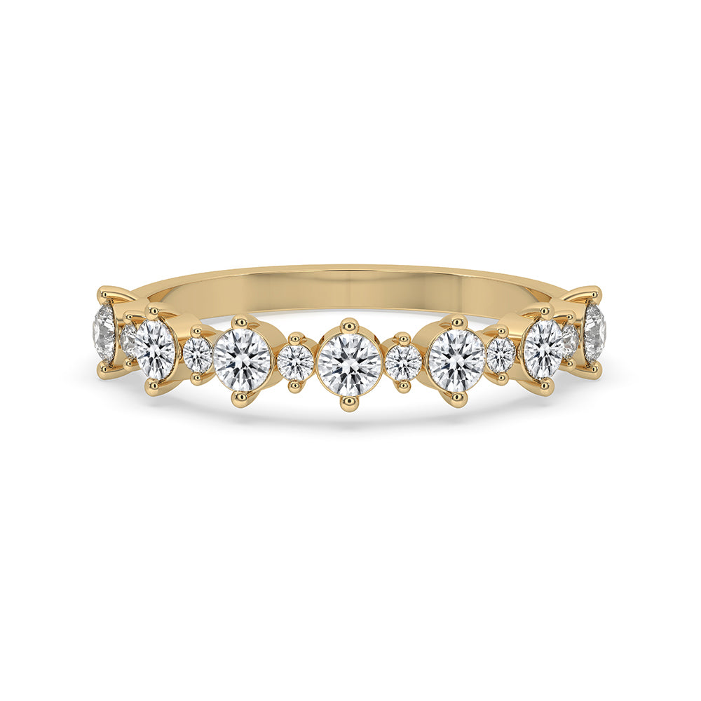 Yellow Gold Eternity Band made with round cut lab grown diamonds.
