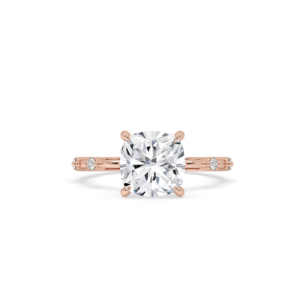 Cushion cut diamond ring with a sparkling design.