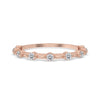 Rose Gold Wedding Band paired with round cut diamond band and distance pave band.
