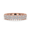 Shared Prong Wedding Band with marquise and round cut diamonds in rose gold.
