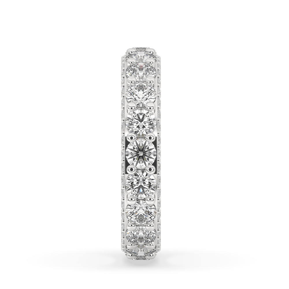 Round diamond wedding band in a full eternity band style.
