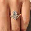 Pear and round diamond band curved style.
