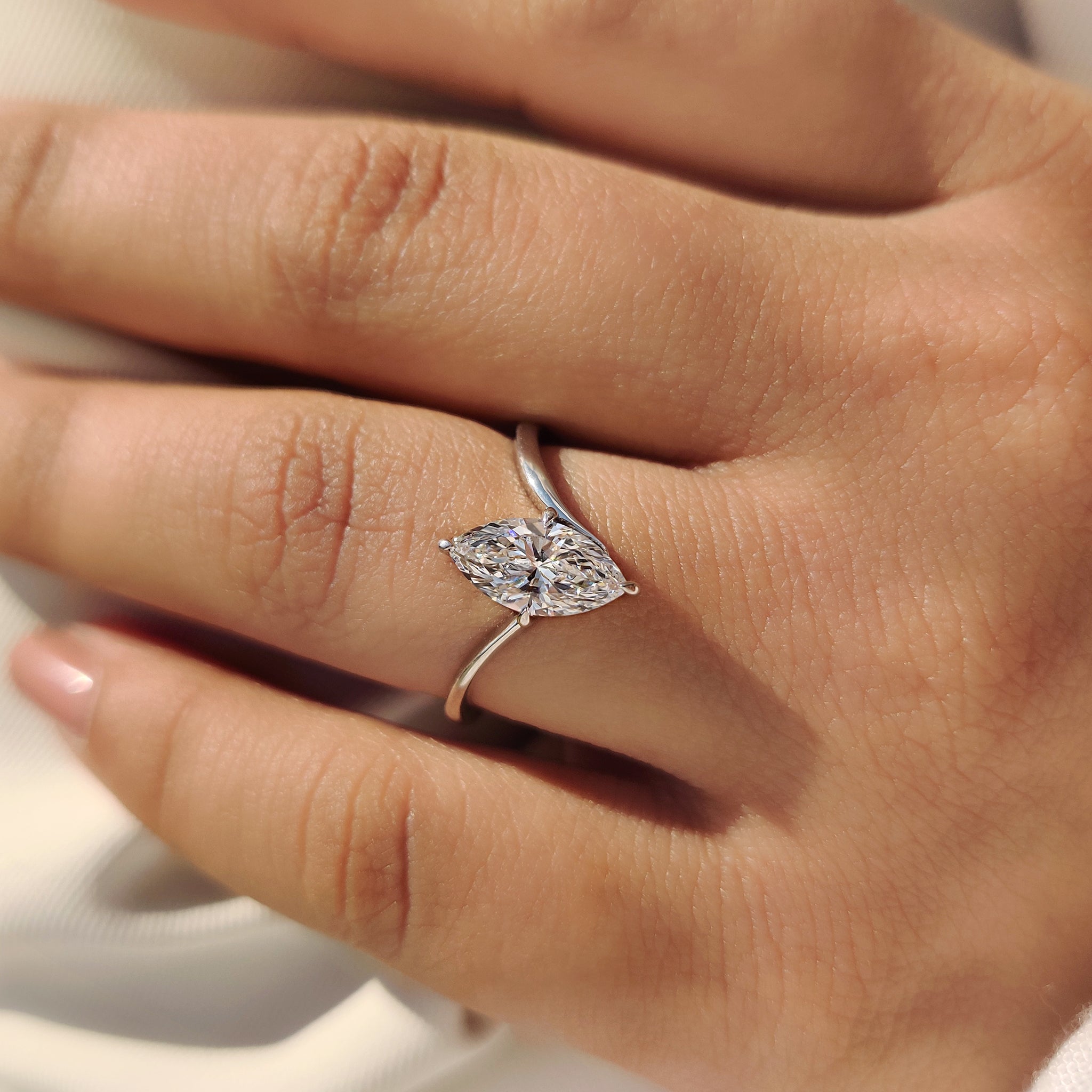 
Handmade marquise engagement ring with unique setting.