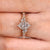 Vintage inspired dutch marquise engagement ring with milgrain details
