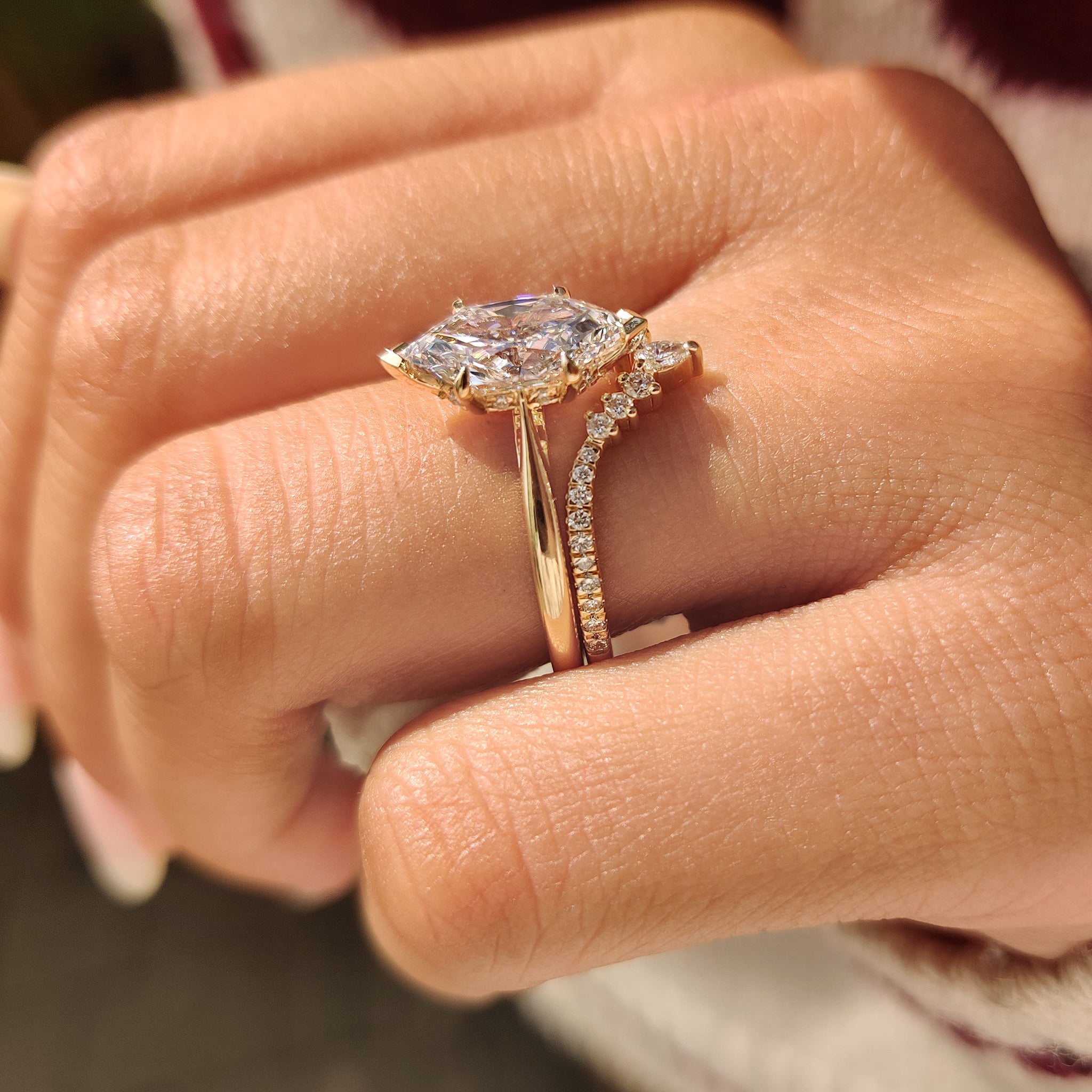 Dutch marquise diamond ring with pear and round diamond band
