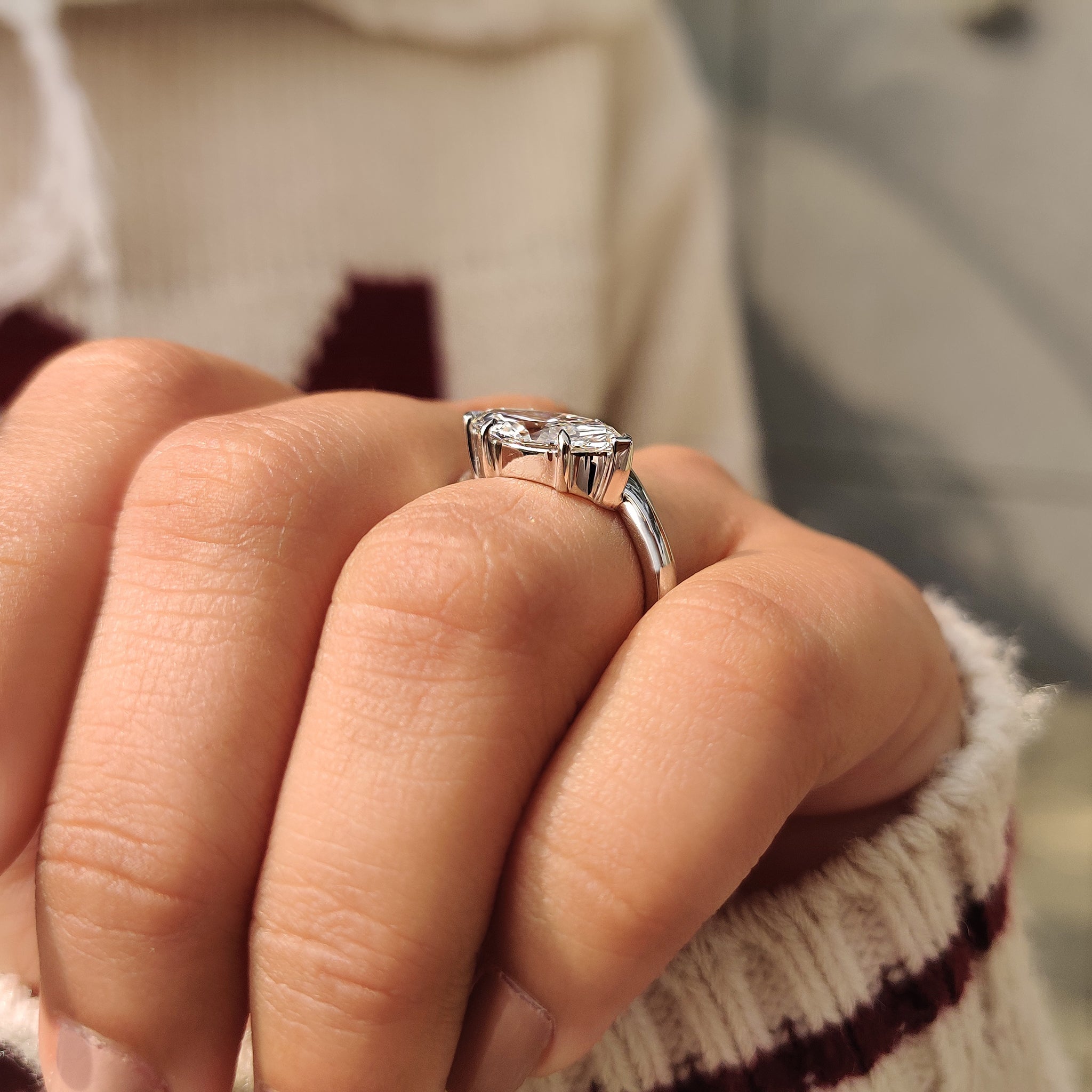 East to west style marquise diamond engagement ring
