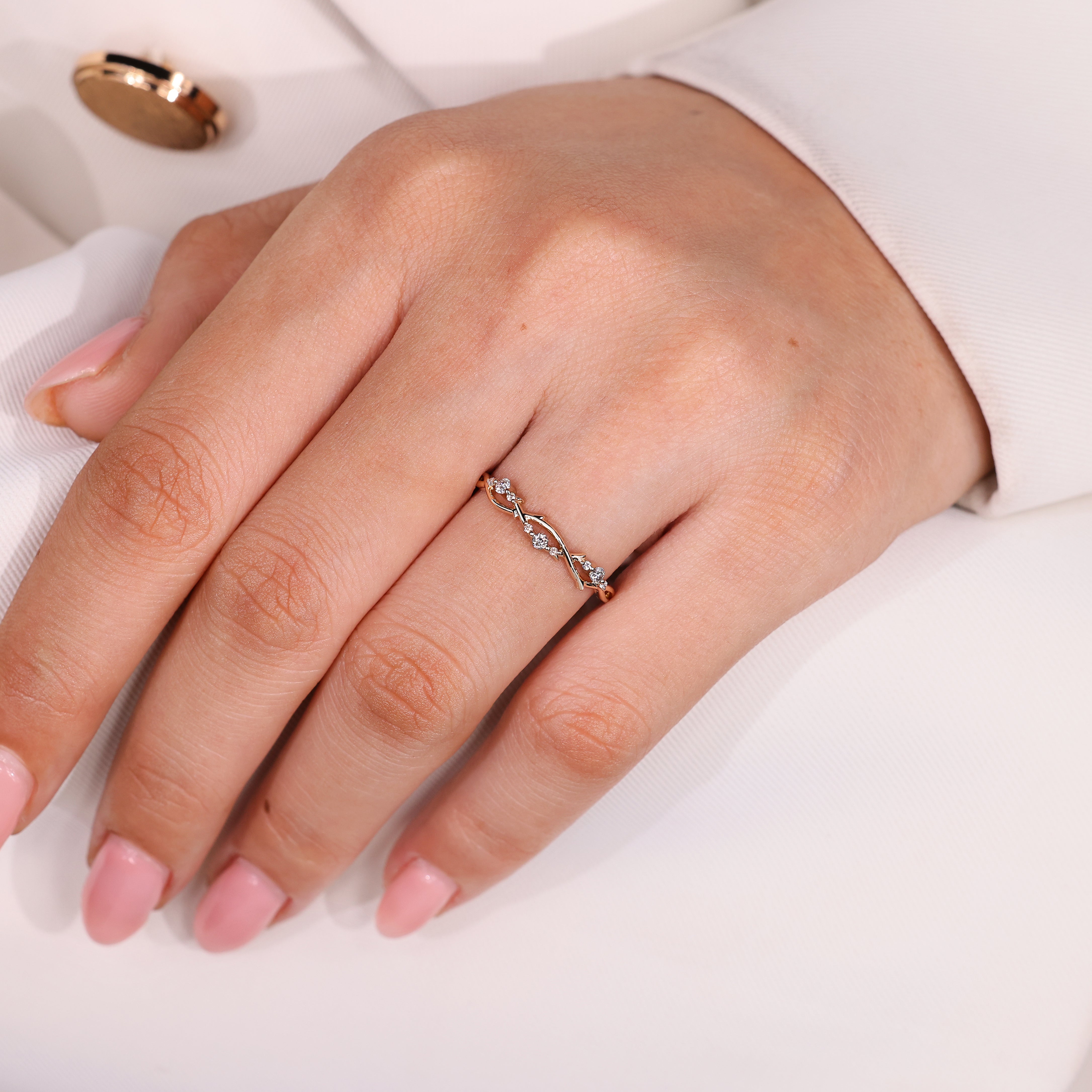 Leaf and vine wedding band with round diamonds
