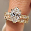 Vintage bridal set with oval cut ring and marquise side stones.
