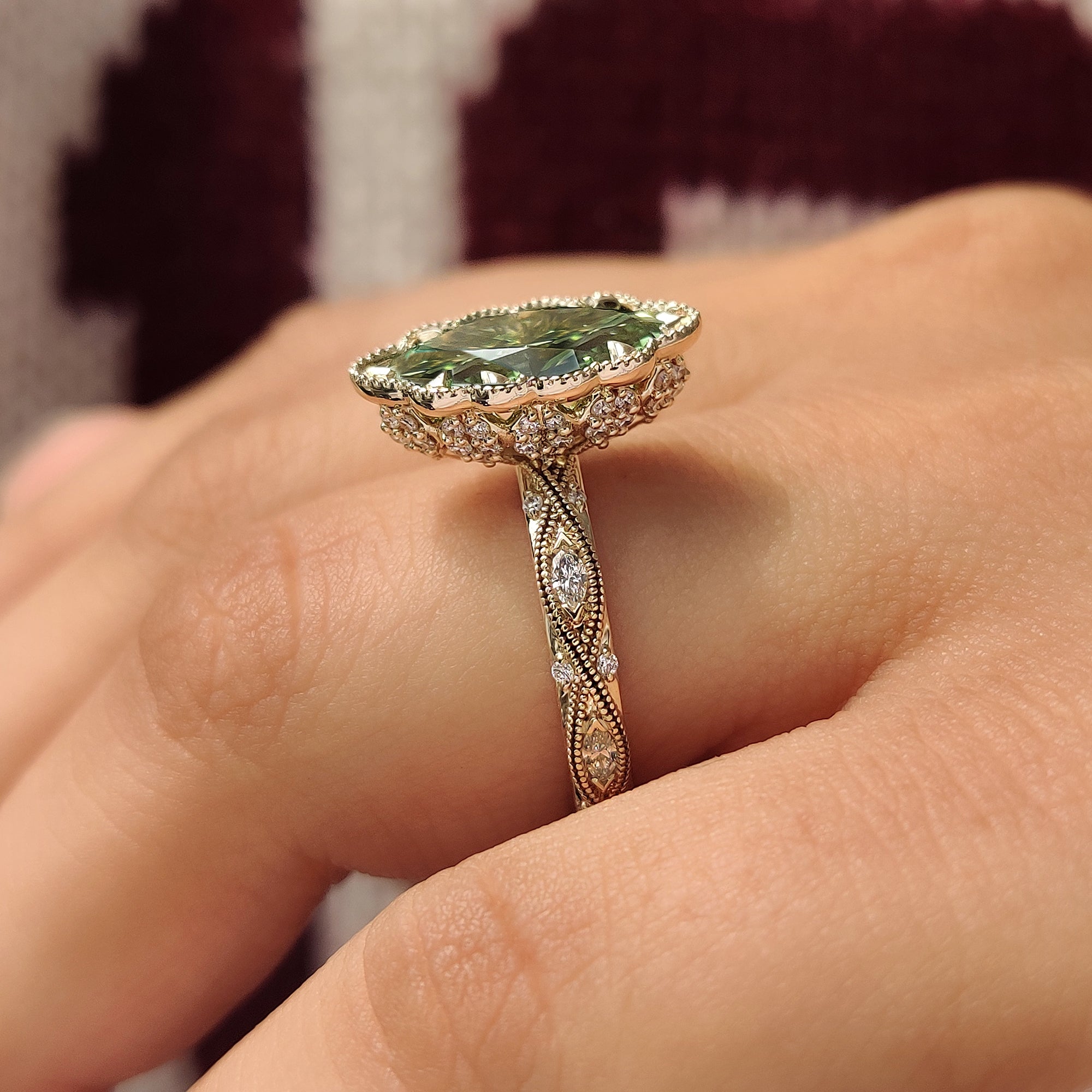 Green Marquise and round pave ring with flower crown.
