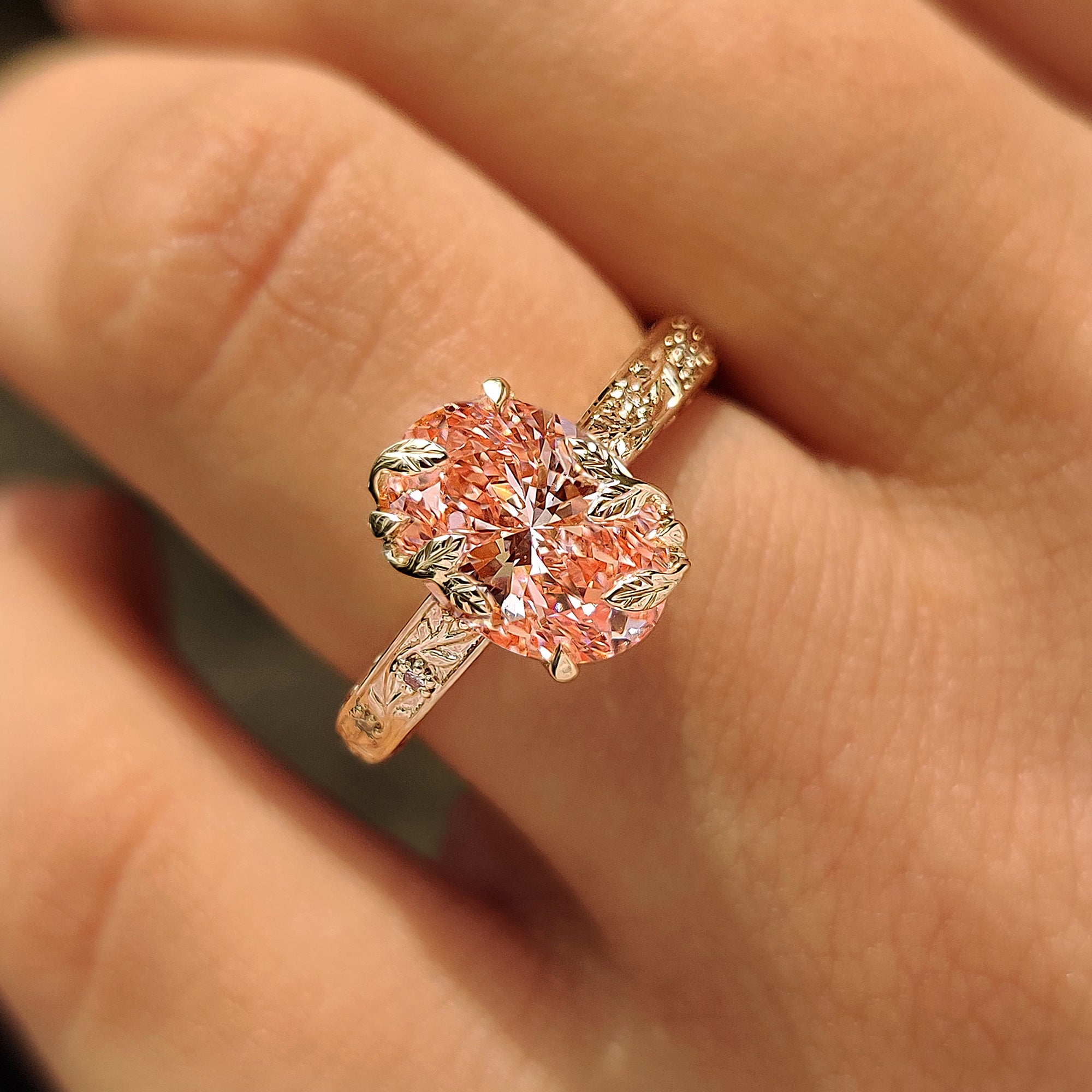 Hand engraved filigree pink oval lab grown diamond ring.
