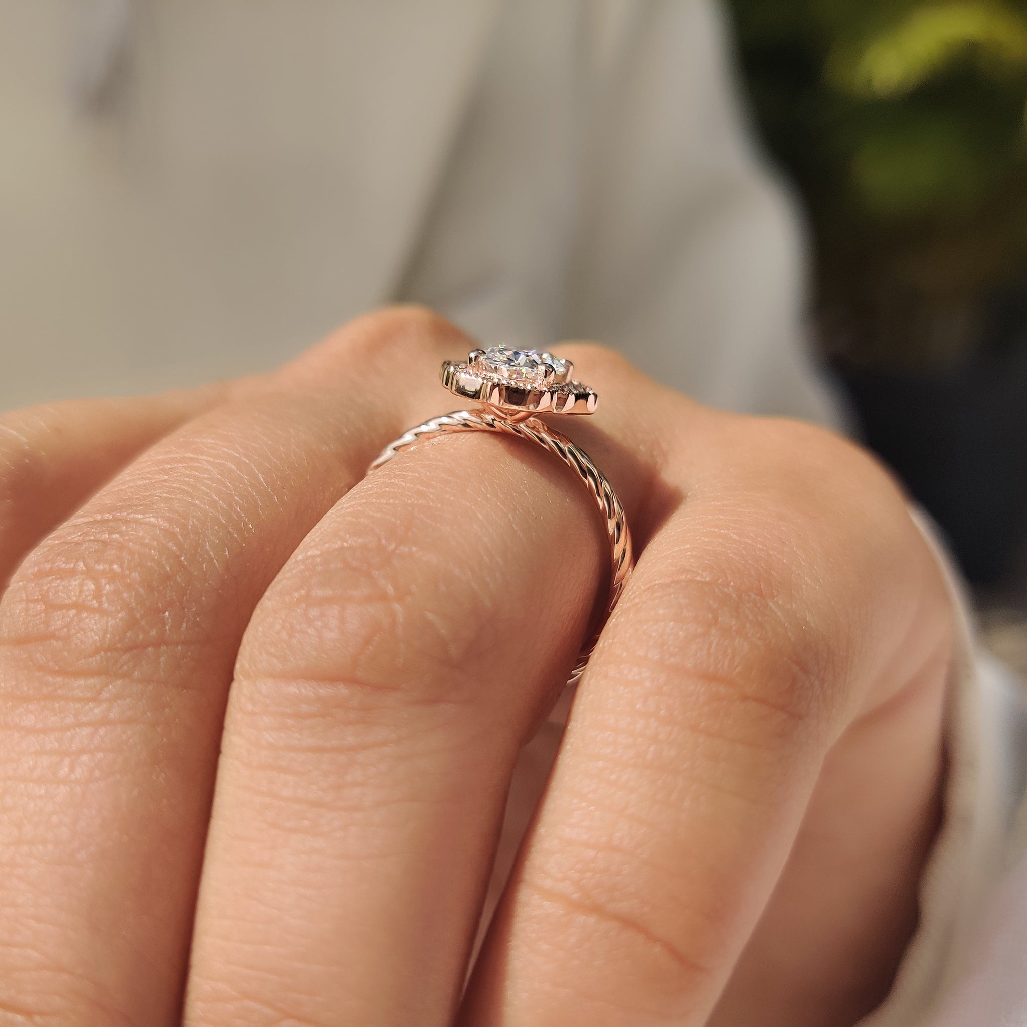 Twisted shank oval diamond engagement ring with lab grown stone
