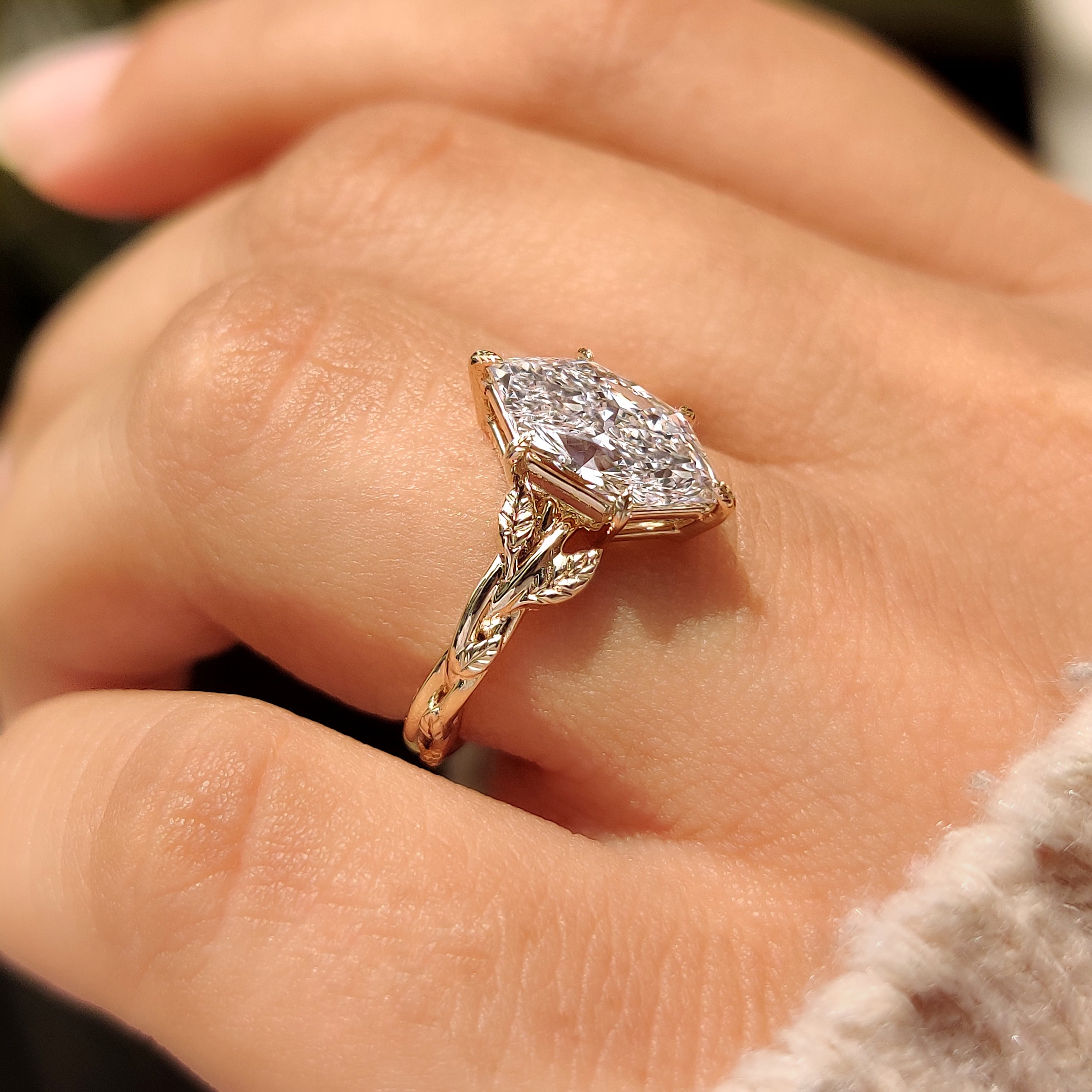 Nature inspired solitaire ring with Dutch marquise diamond
