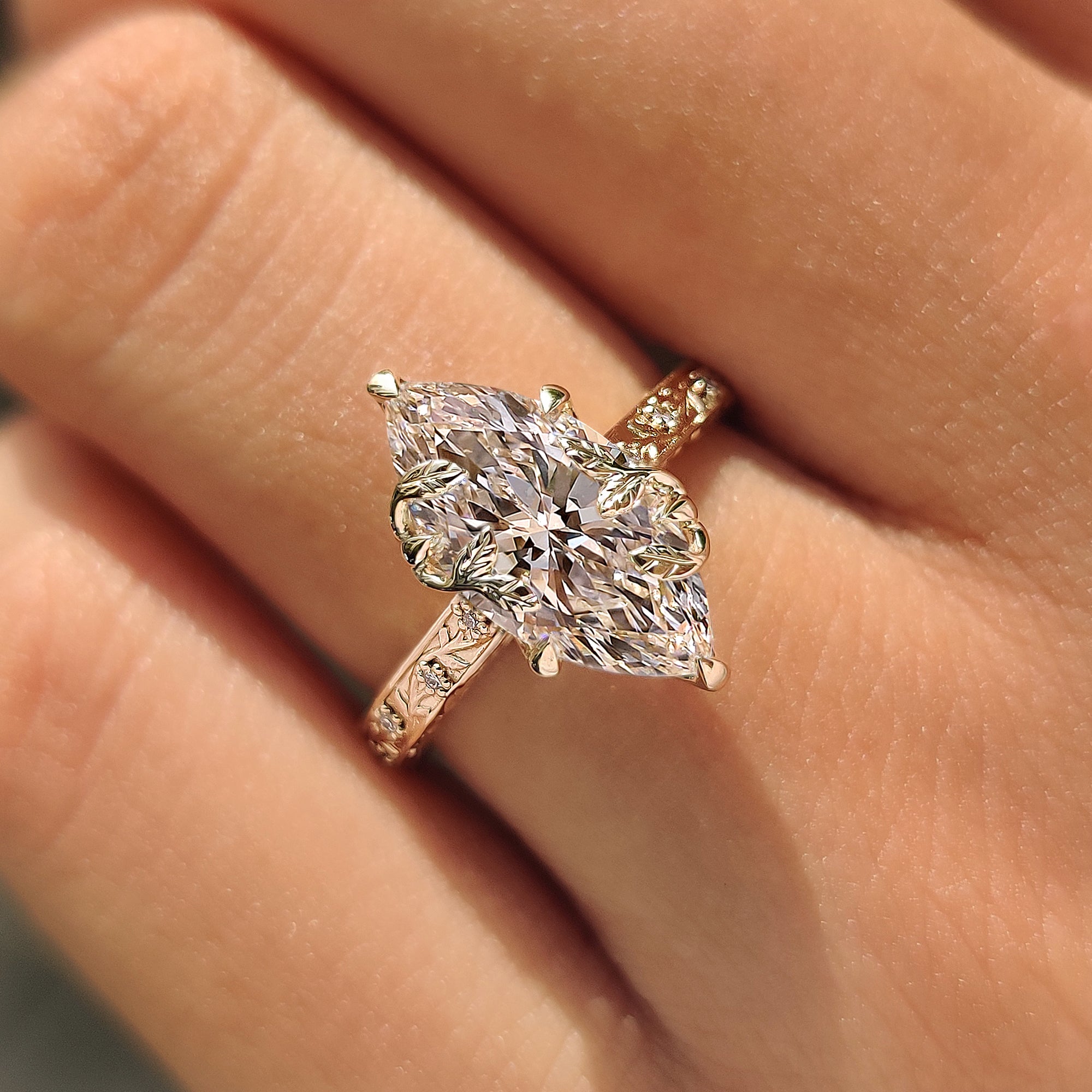 Yellow gold marquise engagement ring by Carat Diamonds.
