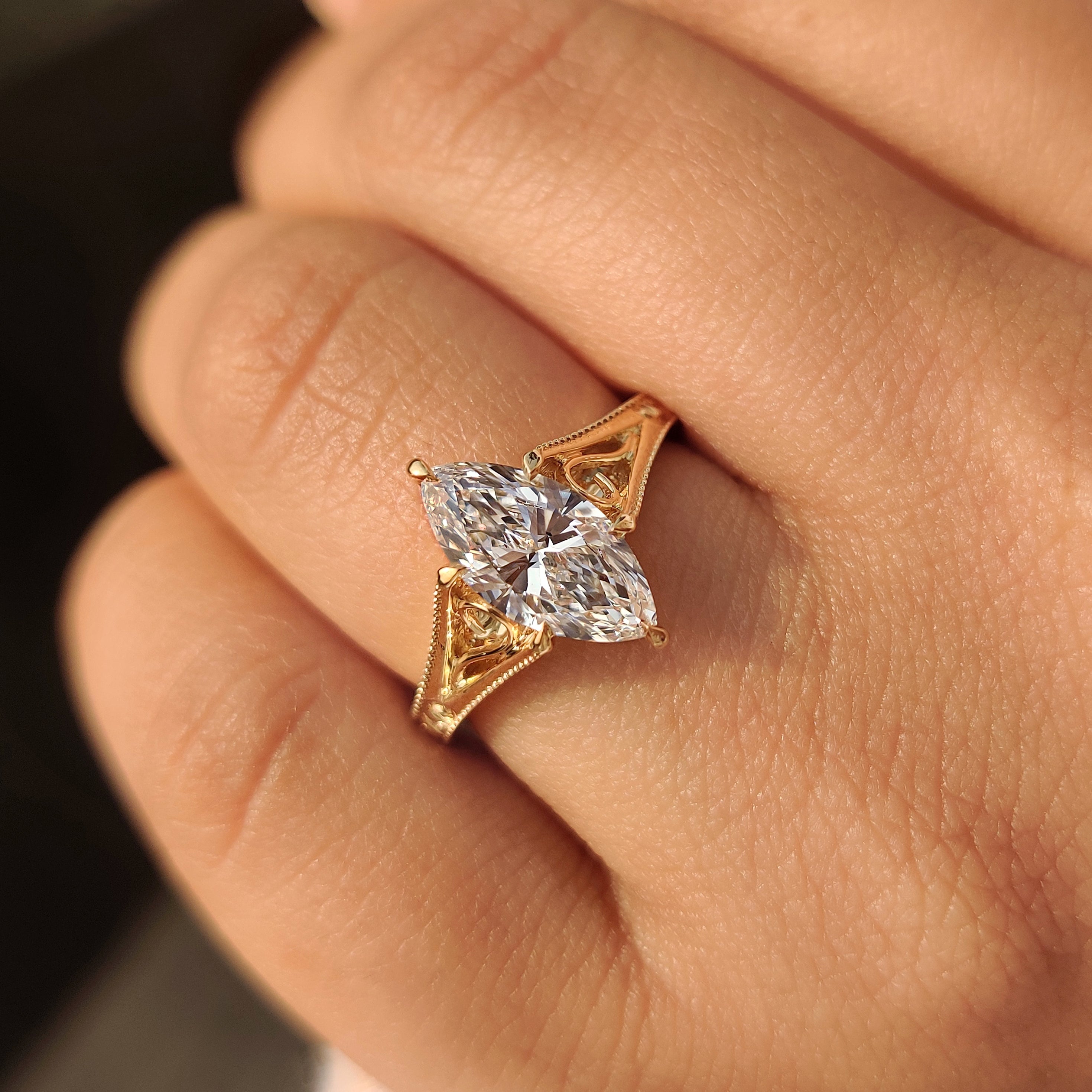 Art deco marquise diamond ring with six claw setting.
