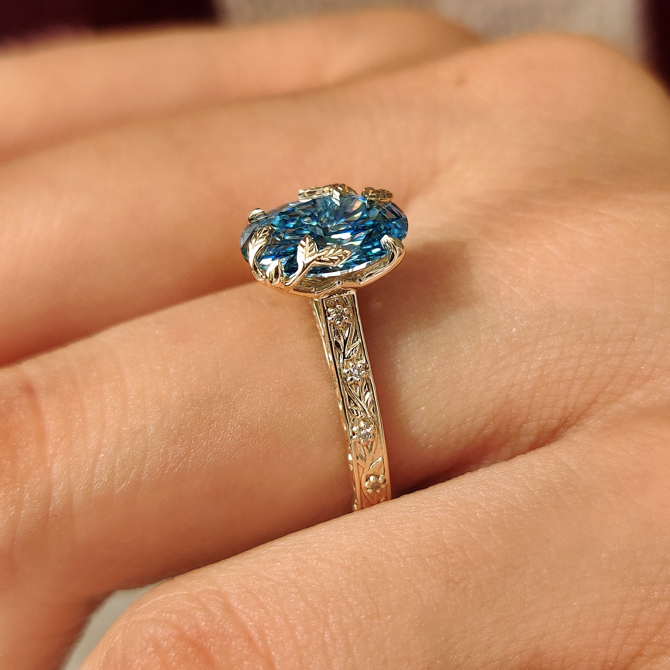 Oval engagement ring with tulip setting
