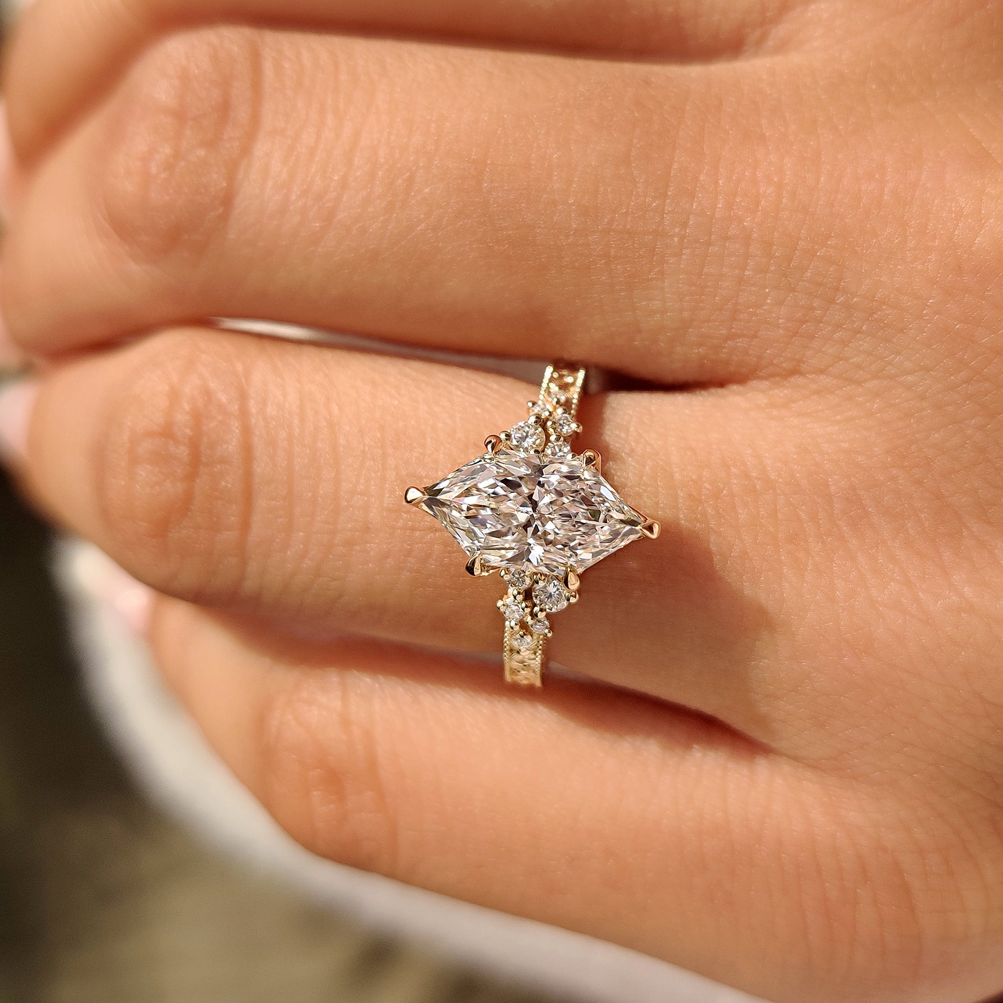 Lab grown diamond ring with flower engraved shank design.
