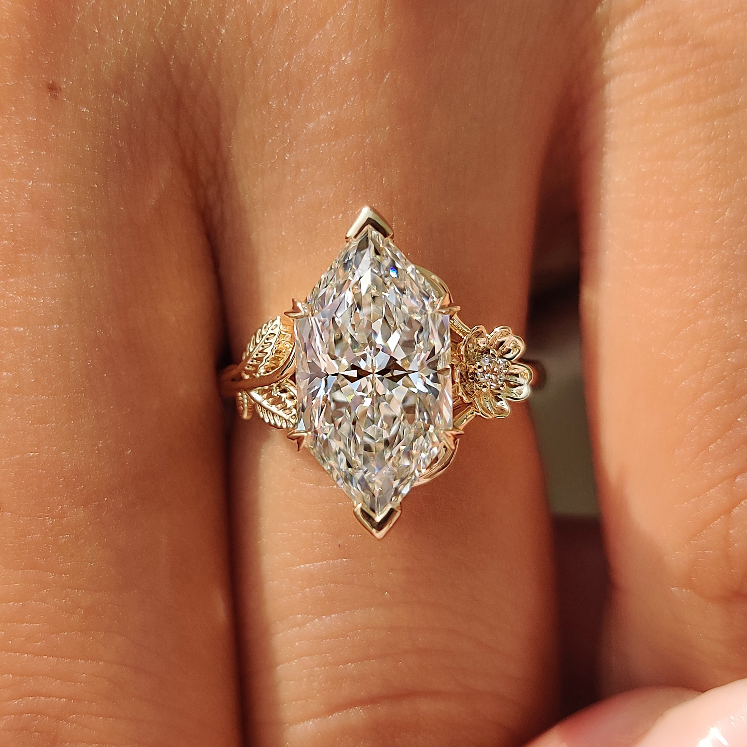 Leaf and branch design on Dutch marquise engagement ring.
