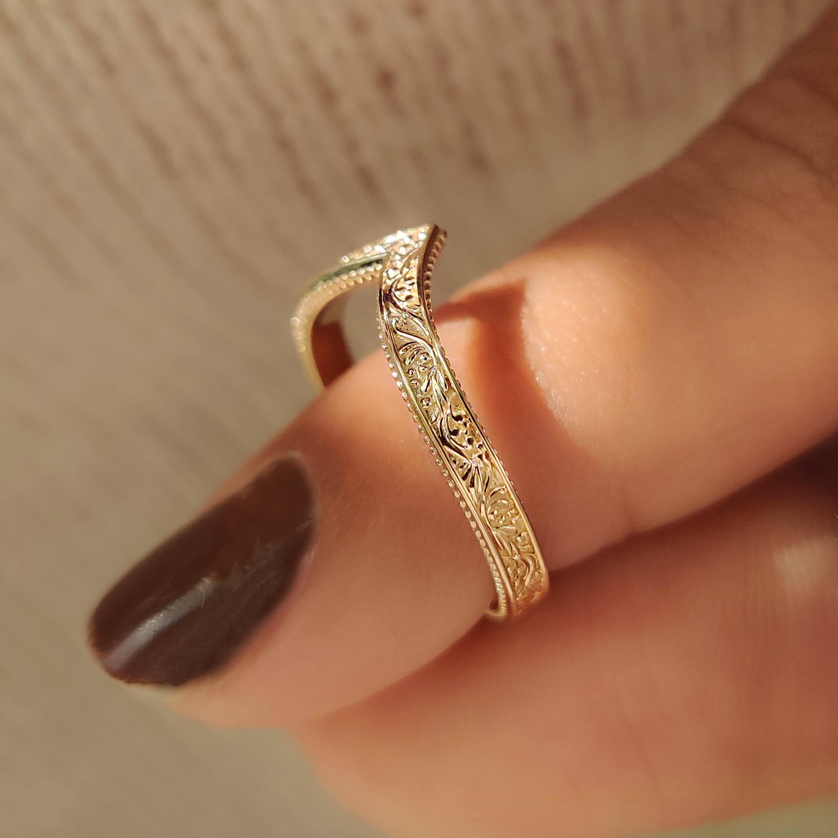 Plain wedding band with Art Deco inspired milgrain accents
