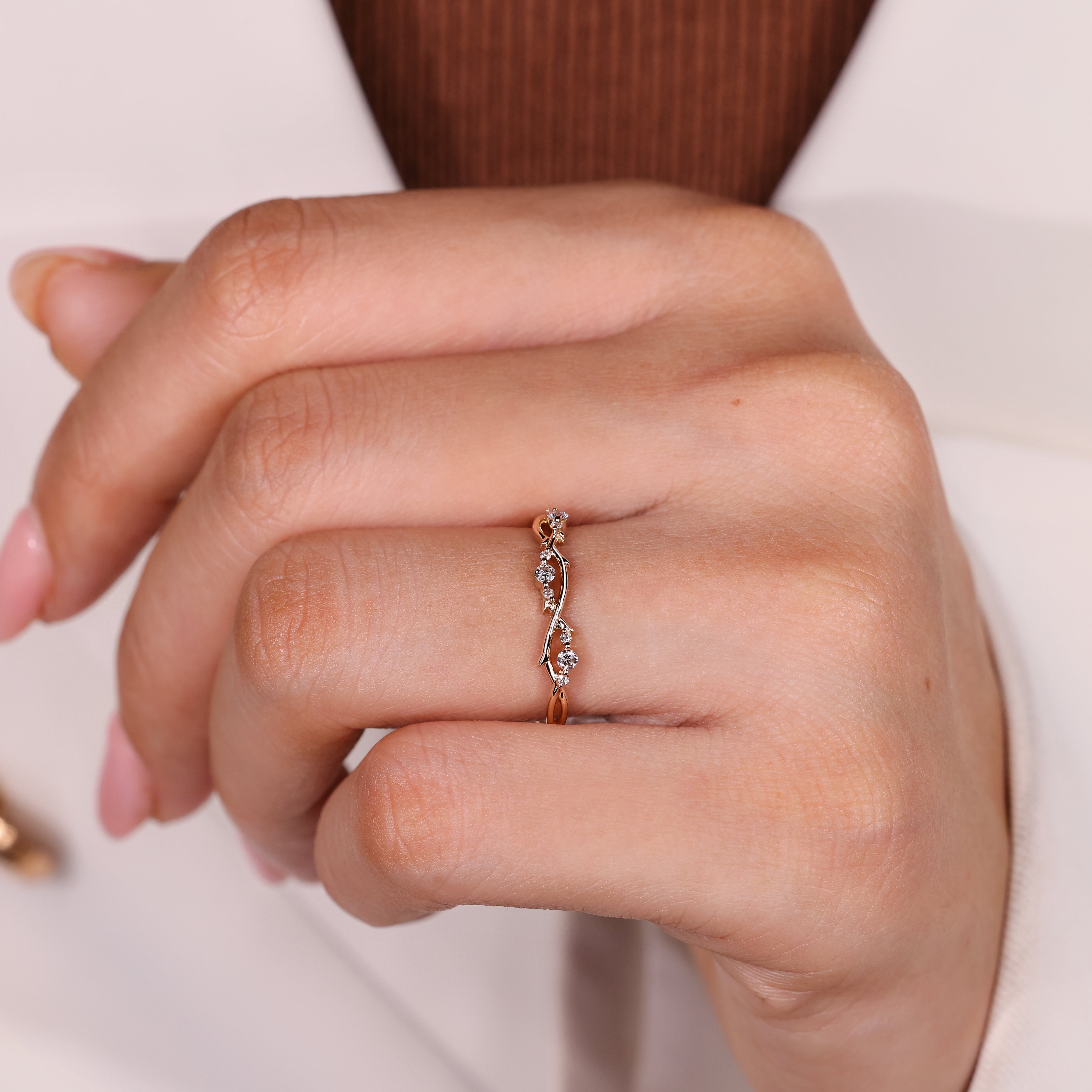 Curved vine design on diamond wedding band
