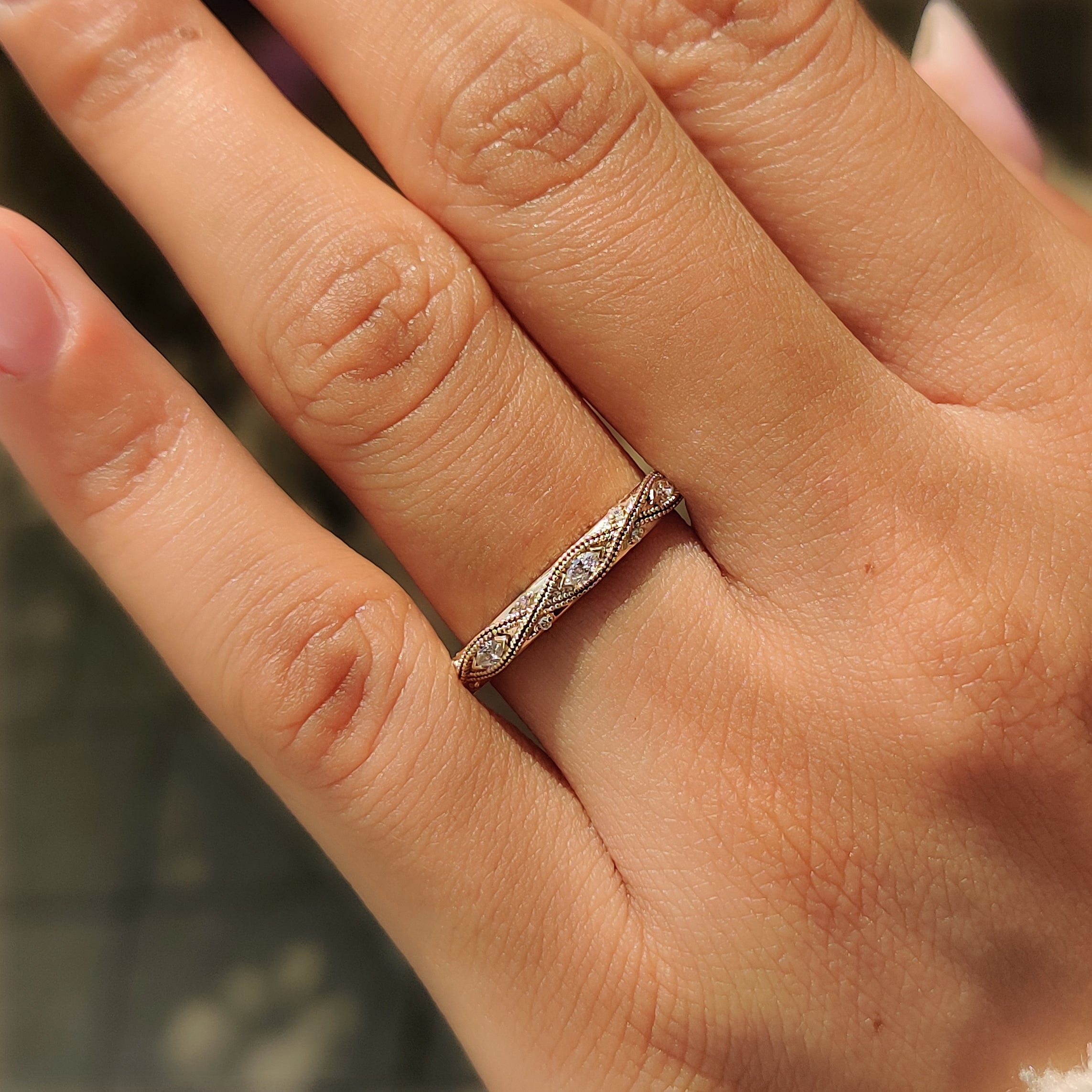 Yellow gold milgrain wedding band with vintage inspired details.
