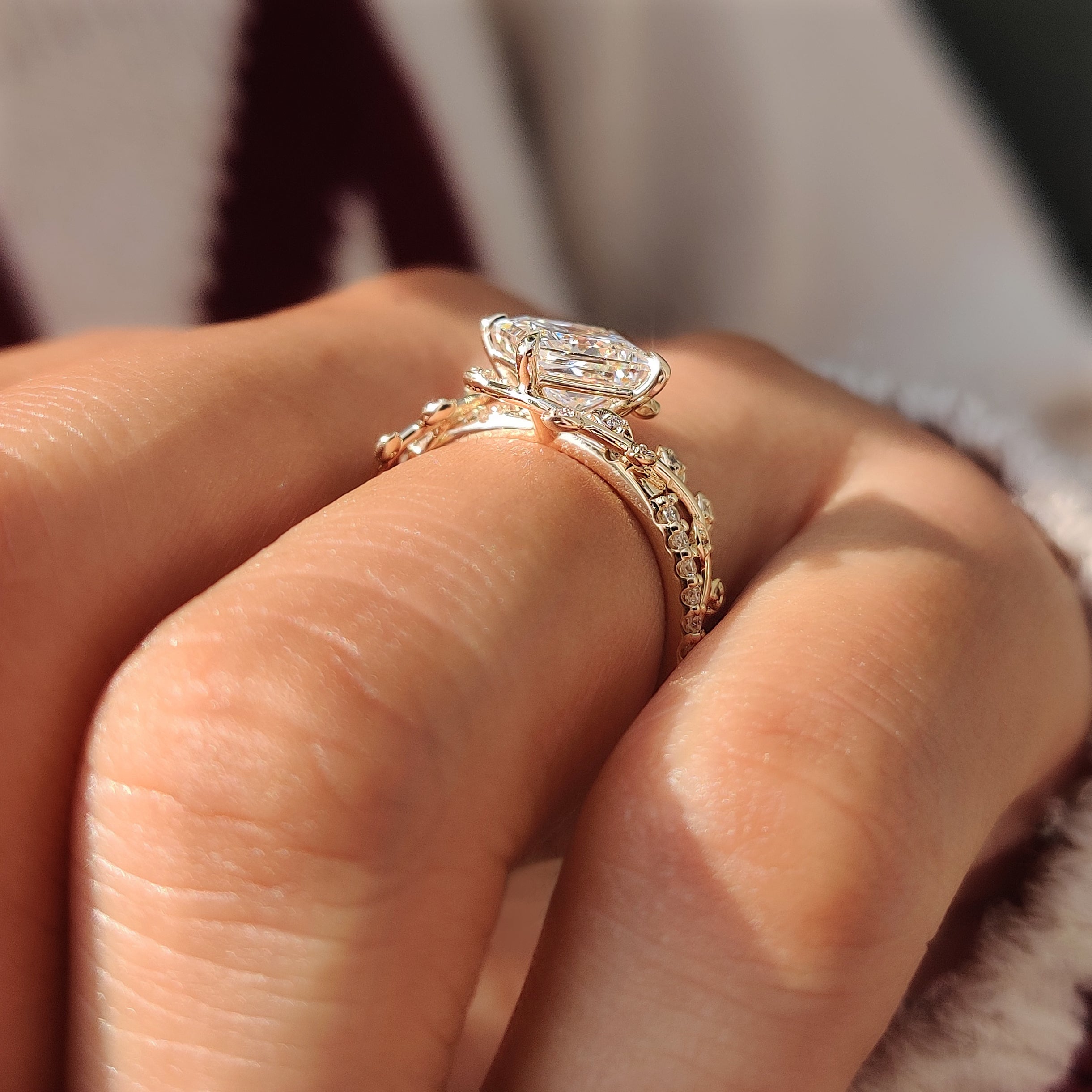 Open gallery below a princess shaped center diamond.
