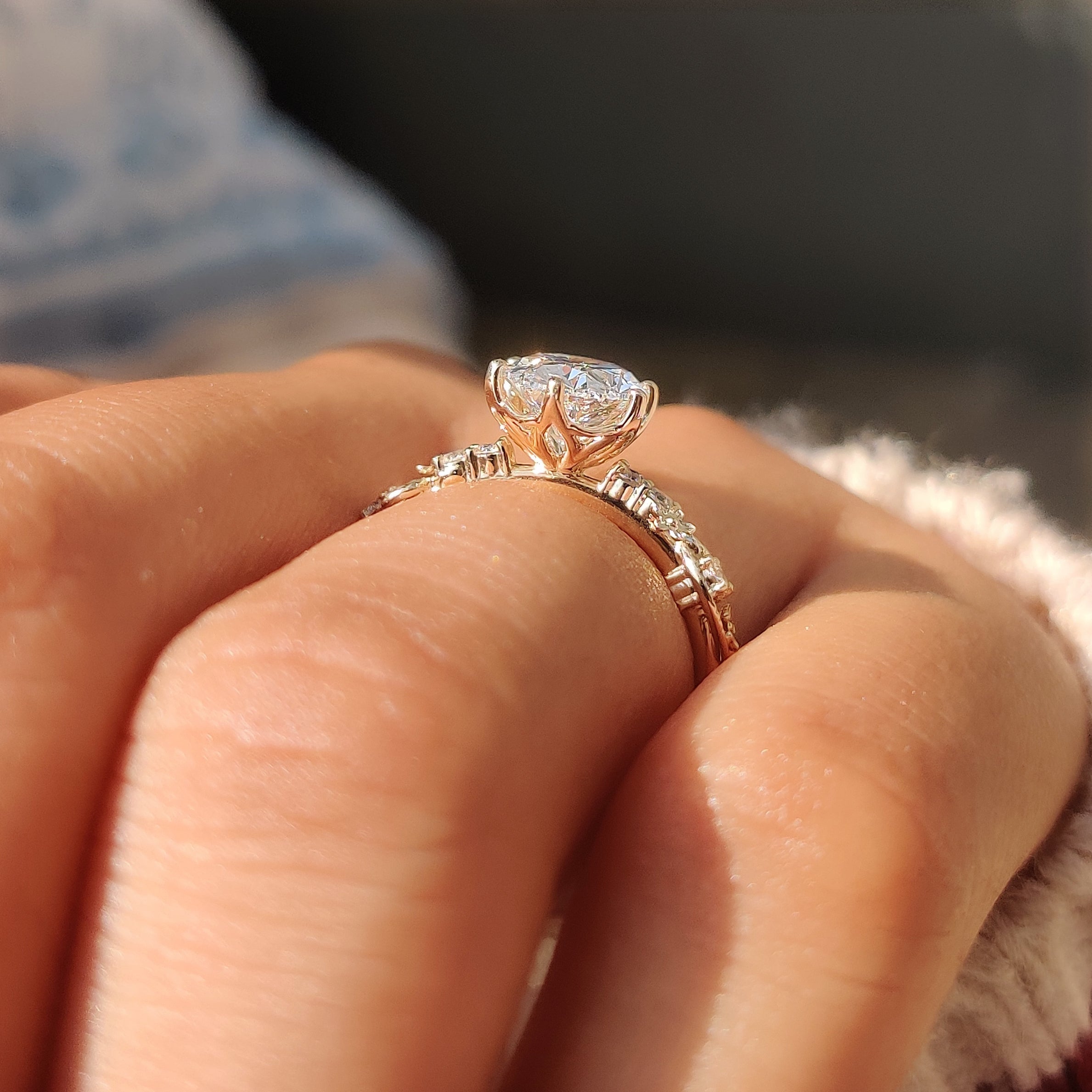 Yellow gold Sakura flower ring with tulip setting.
