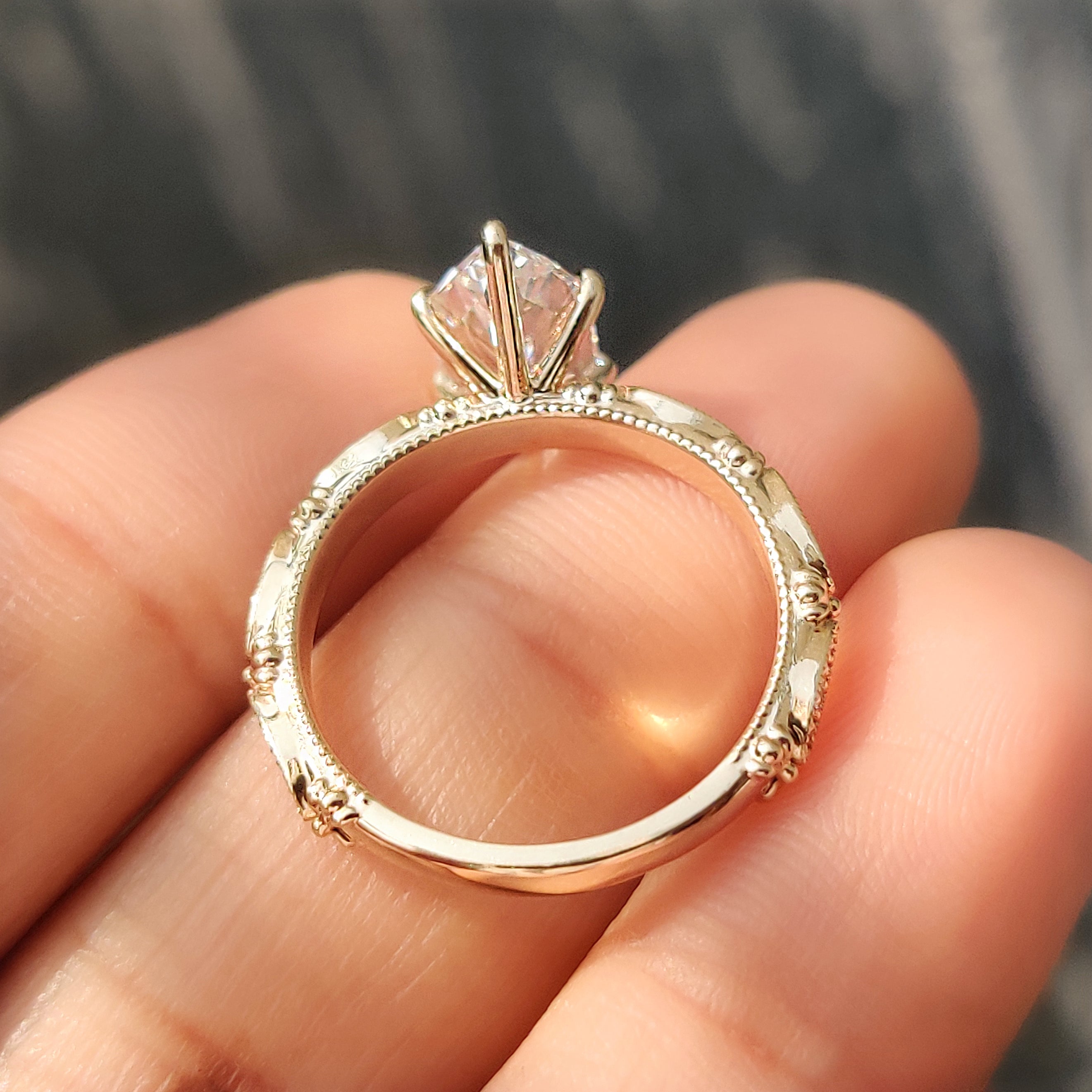 IGI certified 2.00 carat Dutch marquise diamond ring with round cut accents.

