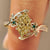 Nature inspired yellow Dutch marquise engagement ring.
