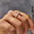 Elegant round cut moissanite ring showcasing timeless beauty.