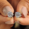 Martini style earrings crafted with round cut Moissanite Earrings and 3 prong setting in white gold.
