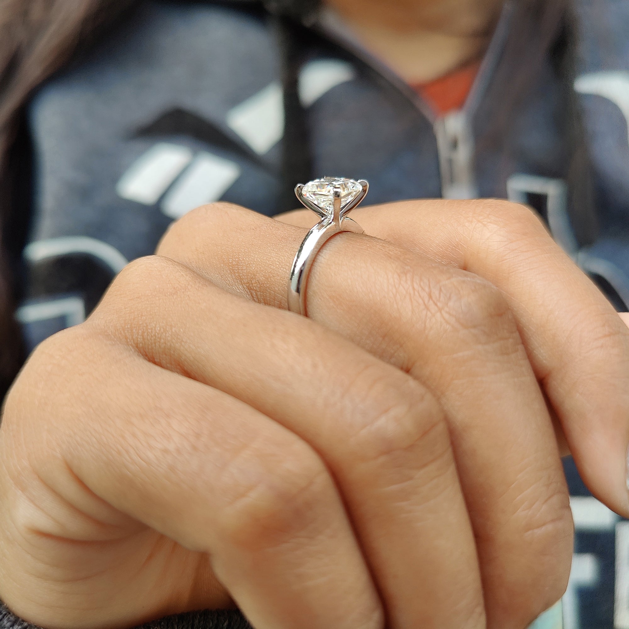 Moissanite solitaire ring with 4 prong setting.
