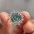 Portuguese cut engagement ring with intricate detailing.
