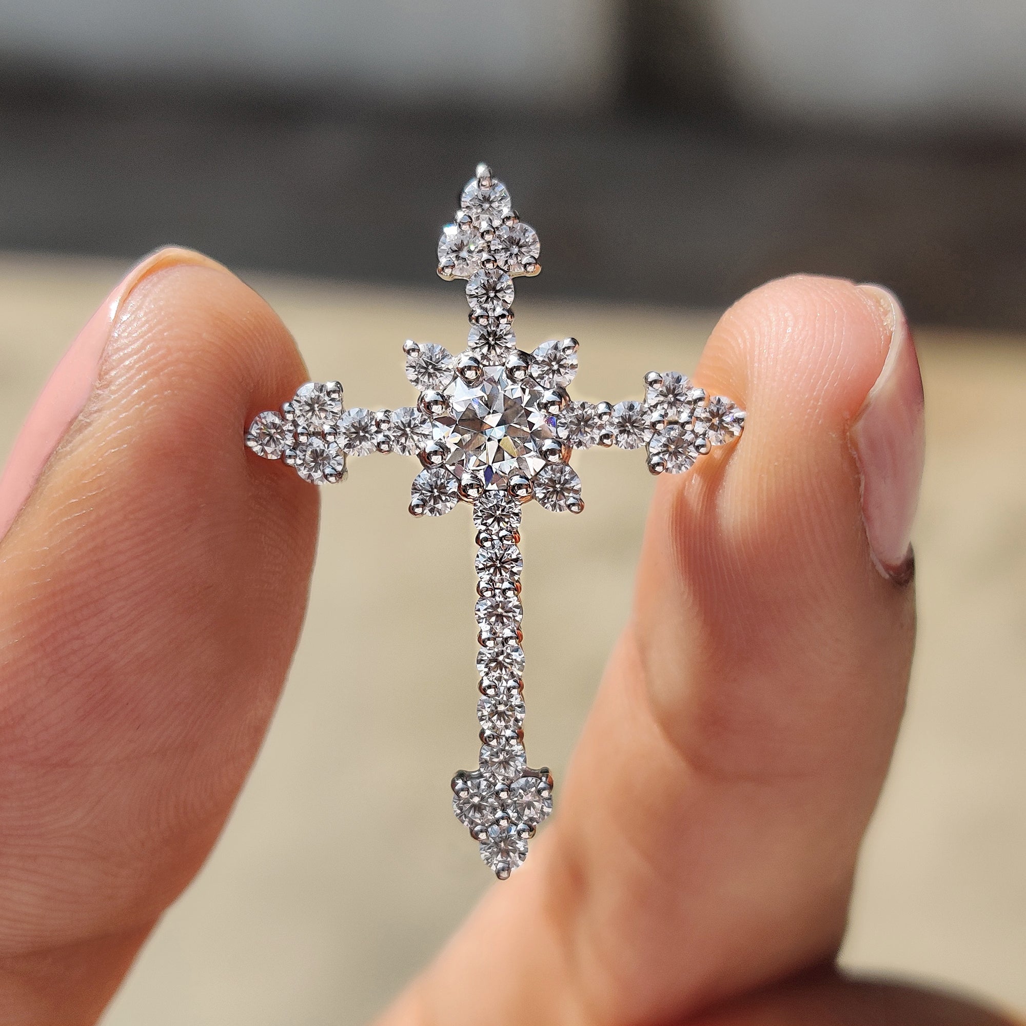 Round cut pendant designed as a prong set pendant with handmade jewelry details.

