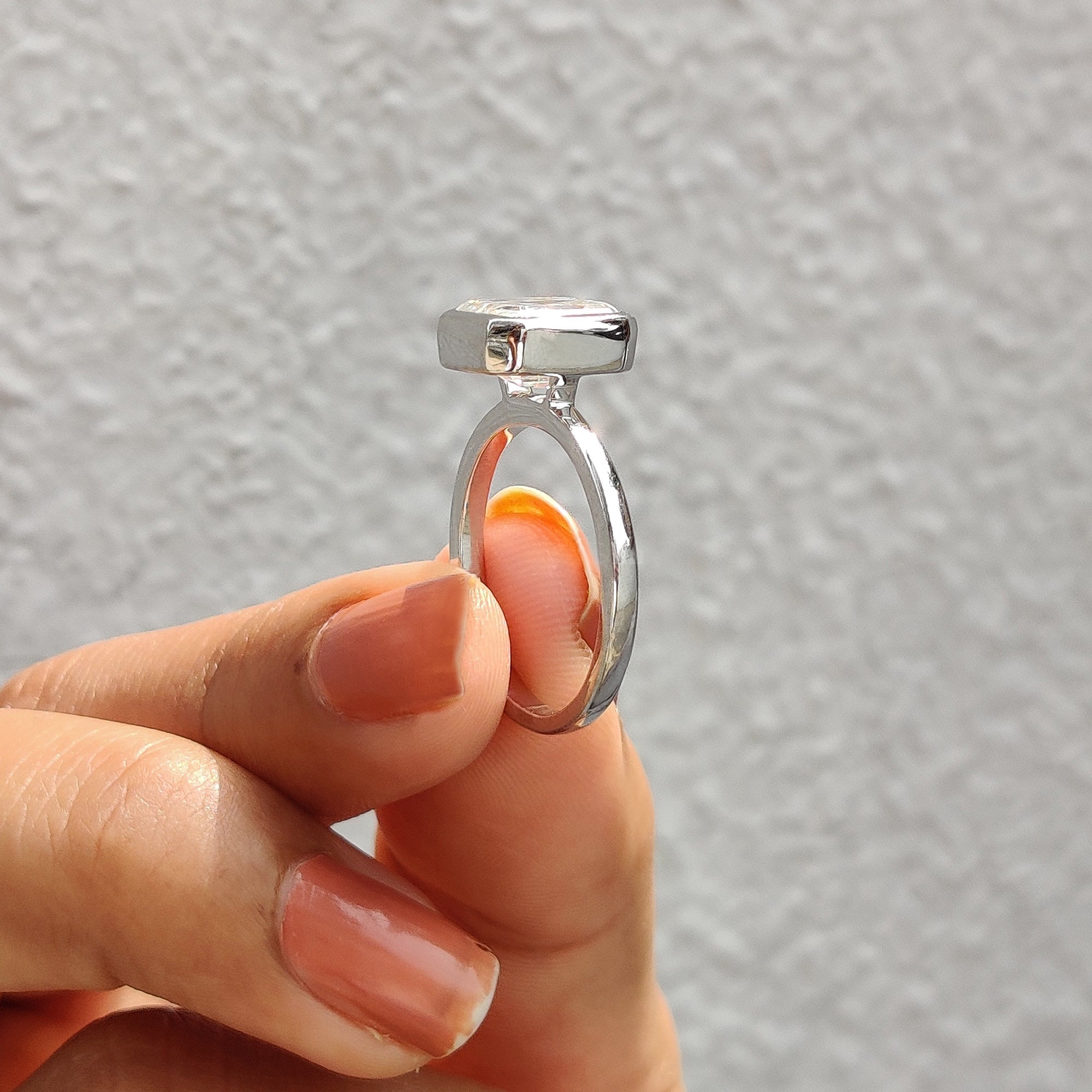 This unique engagement ring stands out with its style.