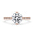 Hidden halo engagement ring with round diamond, IGI certified.
