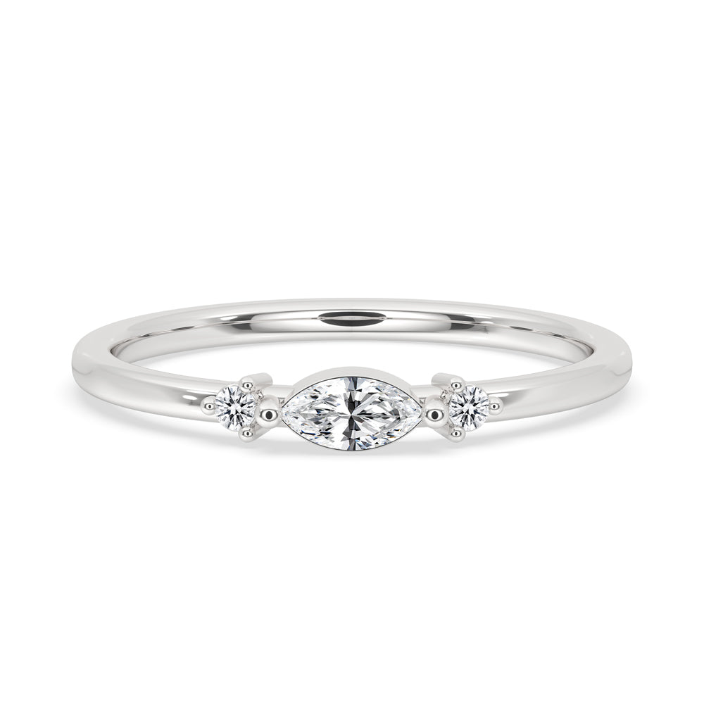 East west marquise ring in a bezel setting with lab grown diamond.
