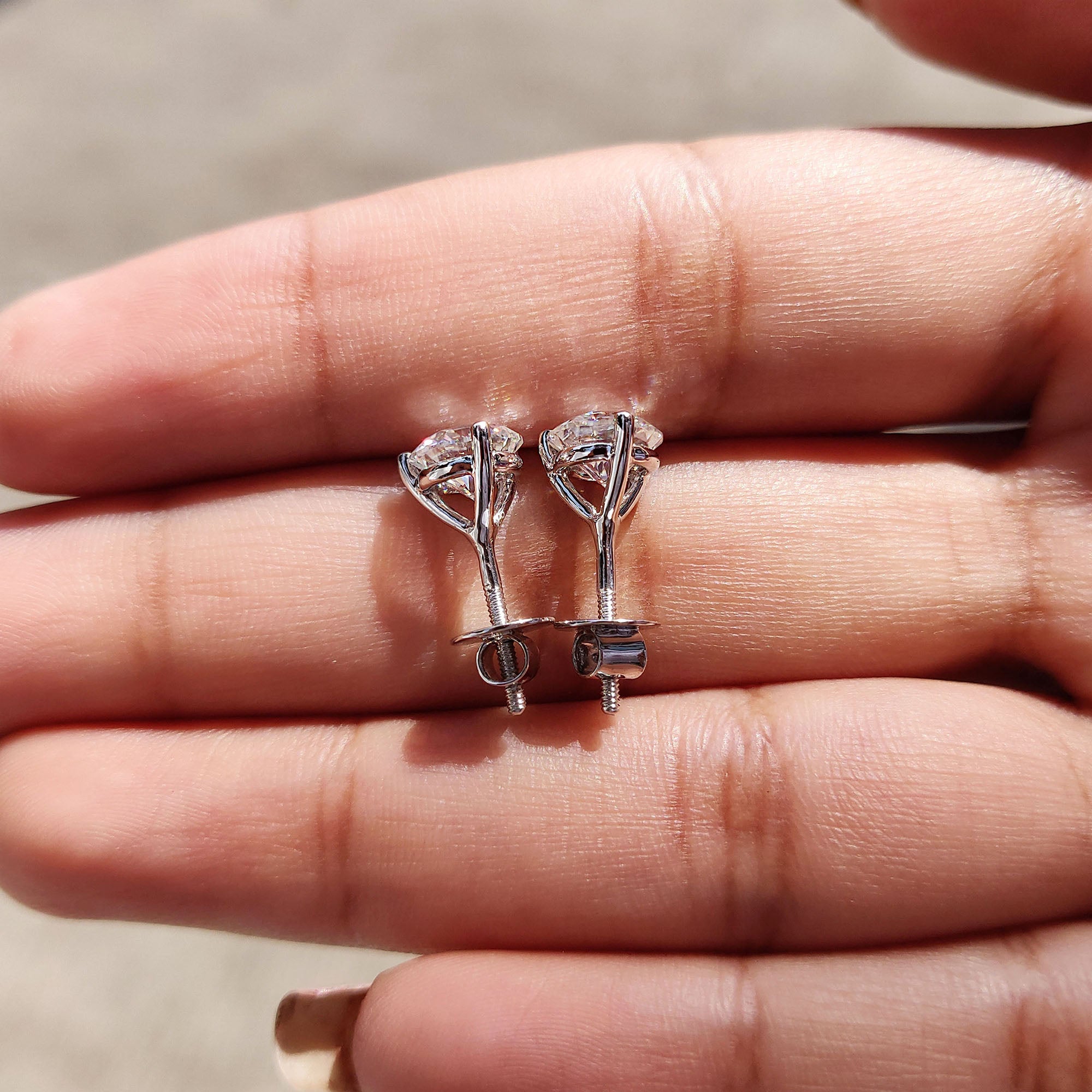 3 prong setting used in Moissanite Earrings with secure screw back earrings.
