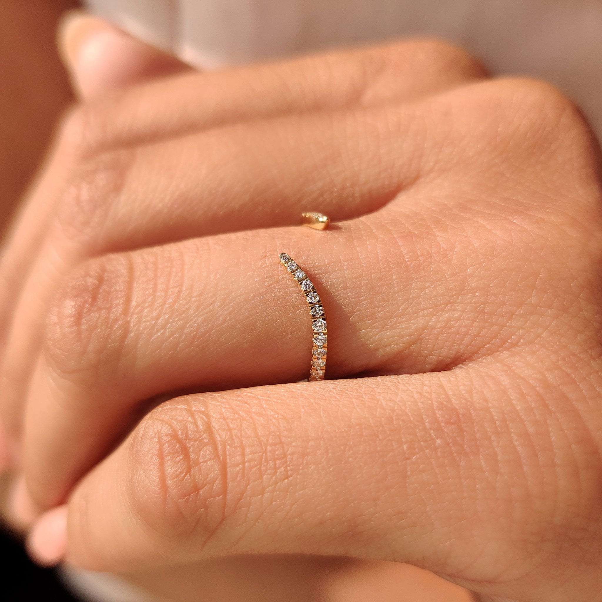 Open gap wedding band with smooth fit and round diamonds
