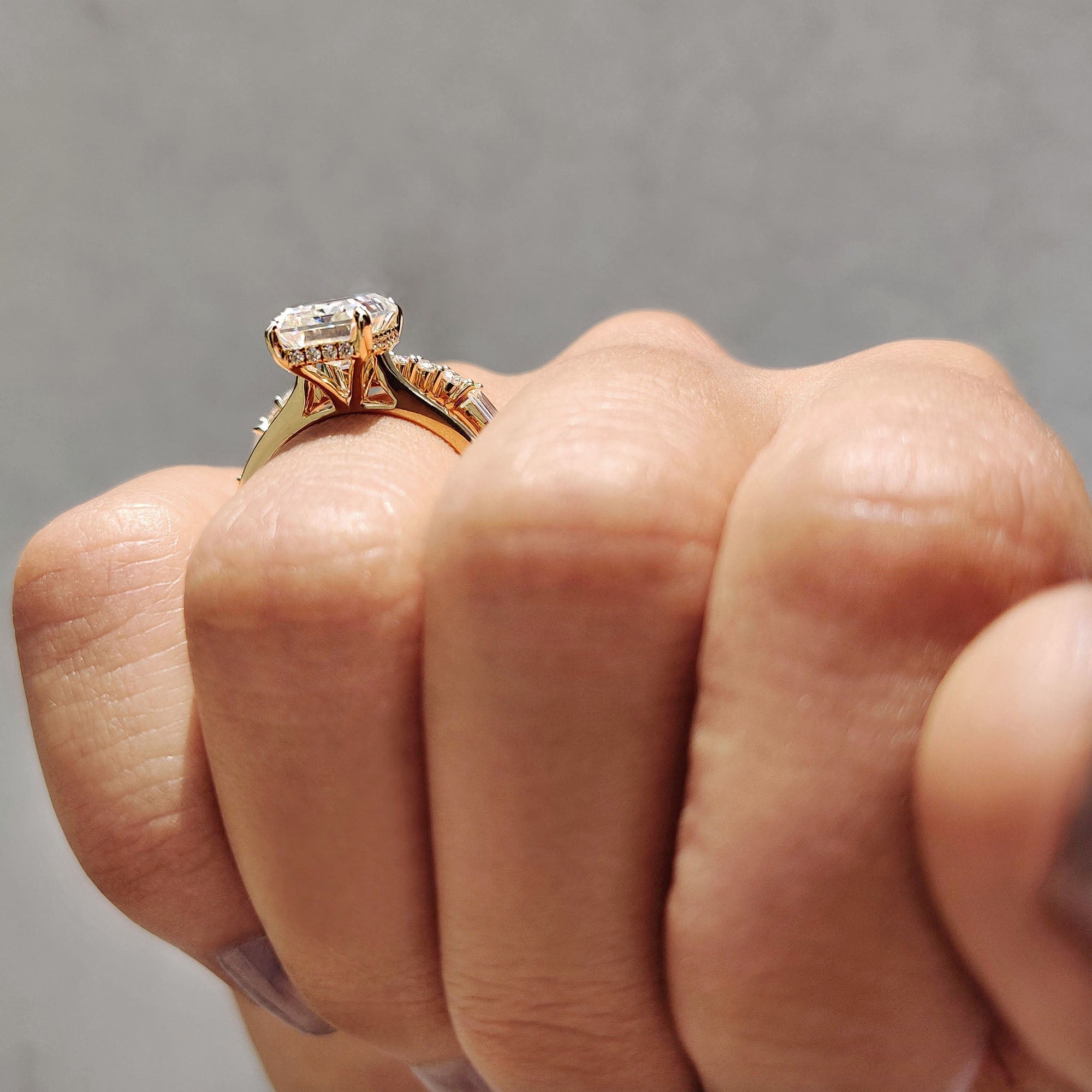 Hidden halo engagement ring paired with a full eternity wedding band.
