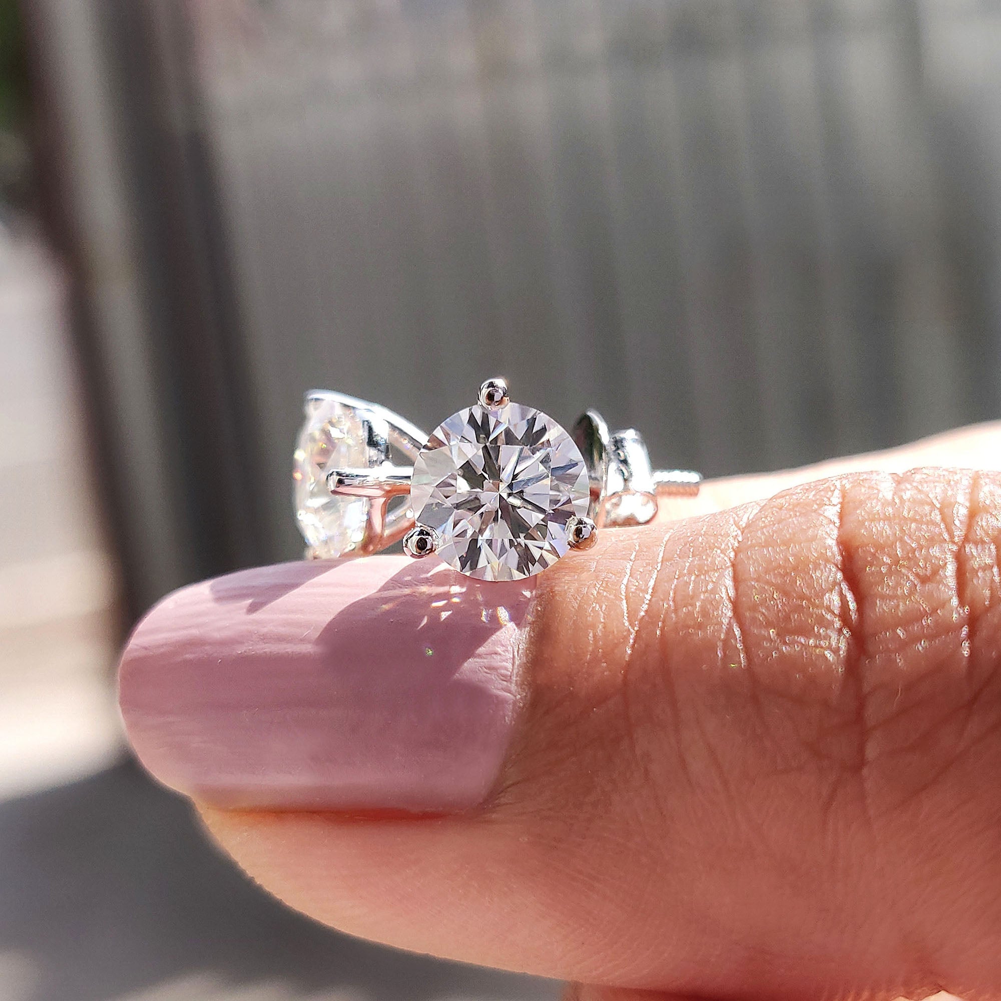 Screw back earrings featured on round cut stud earrings from carat Diamonds earrings.
