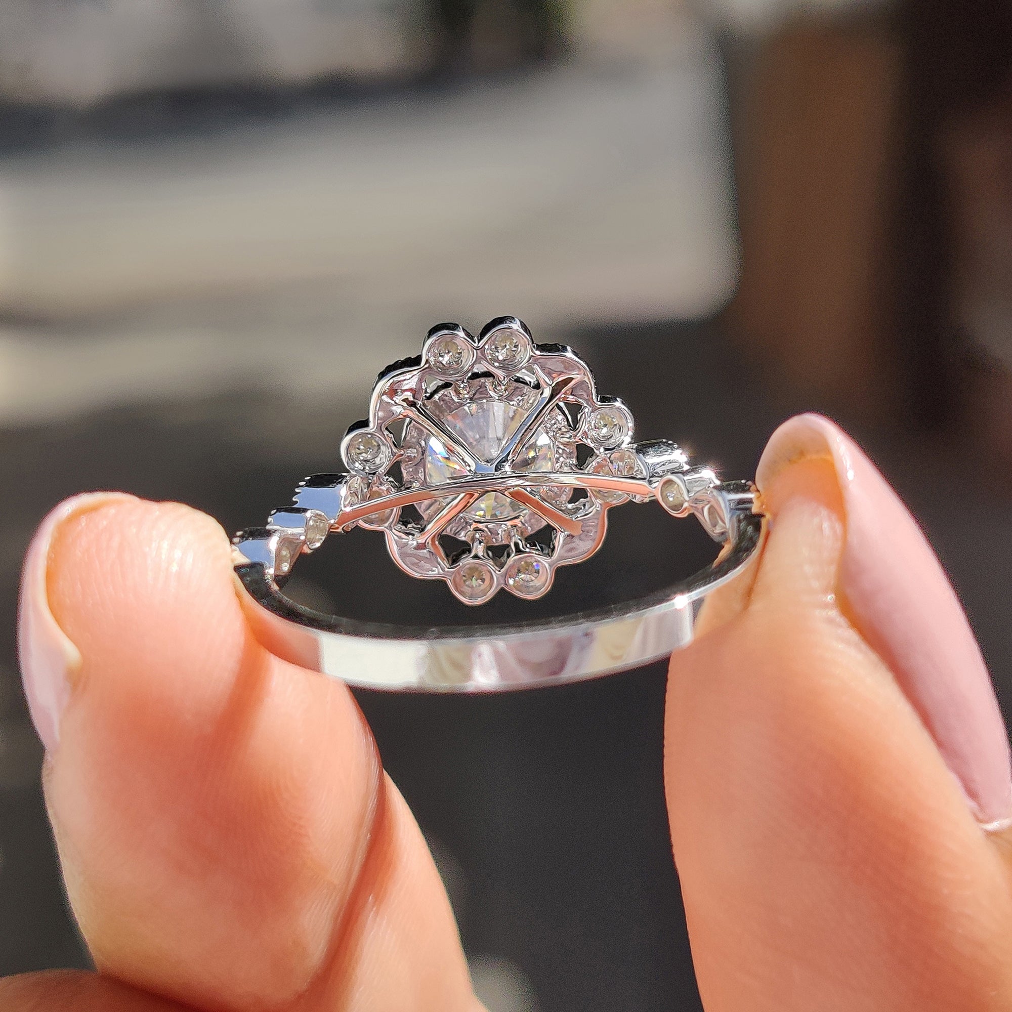 Halo ring featuring a stunning moissanite center.
